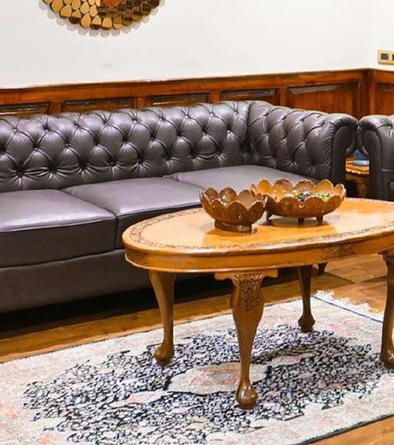 Silk carpet and walnut table in a lounge