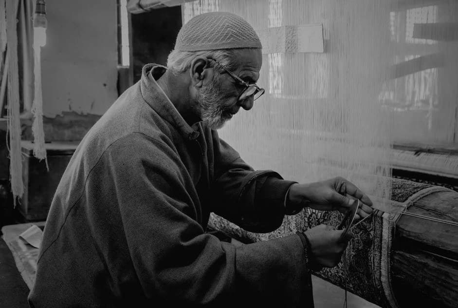 A master weaver at the loom in Kashmir